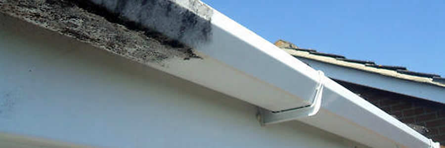 Gutter cleaning before and after image